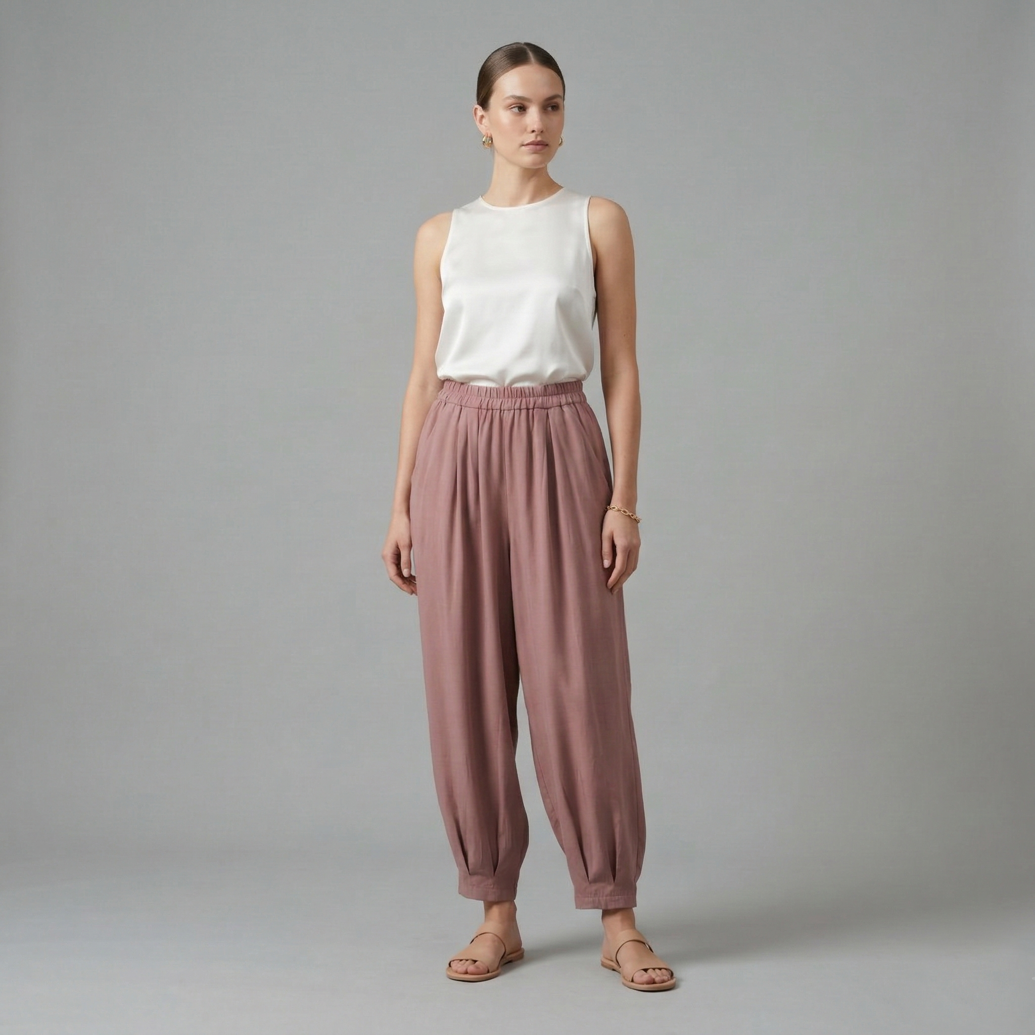 Chic dusty rose high-waisted harem trousers with an elasticated waistband