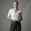 Chic white V-neck top with an elegant front twist detail