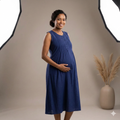 Elegant navy blue sleeveless pleated midi dress