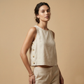 Elegant beige sleeveless linen-blend blouse with decorative side buttons