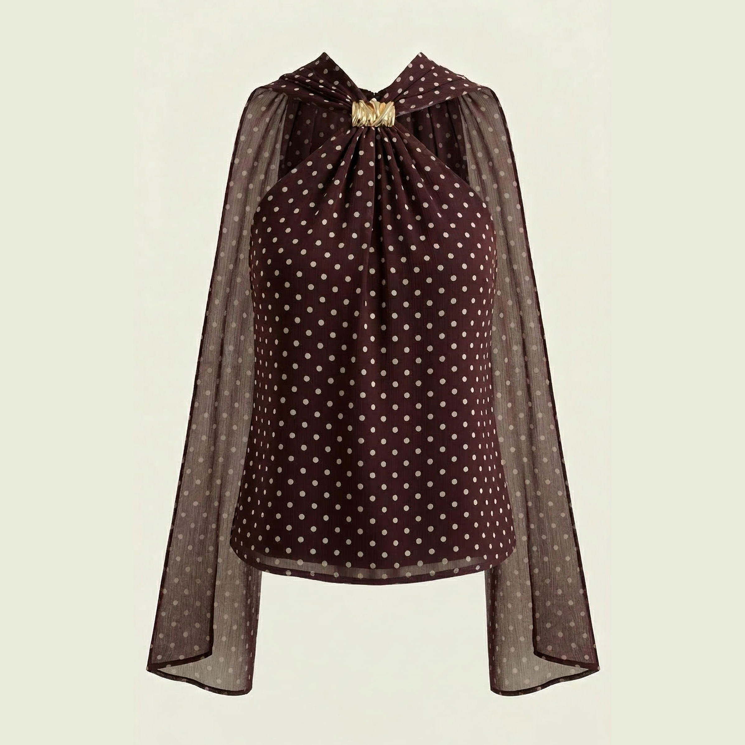 Brown polka dot blouse with a gathered neckline and flowing sleeves.