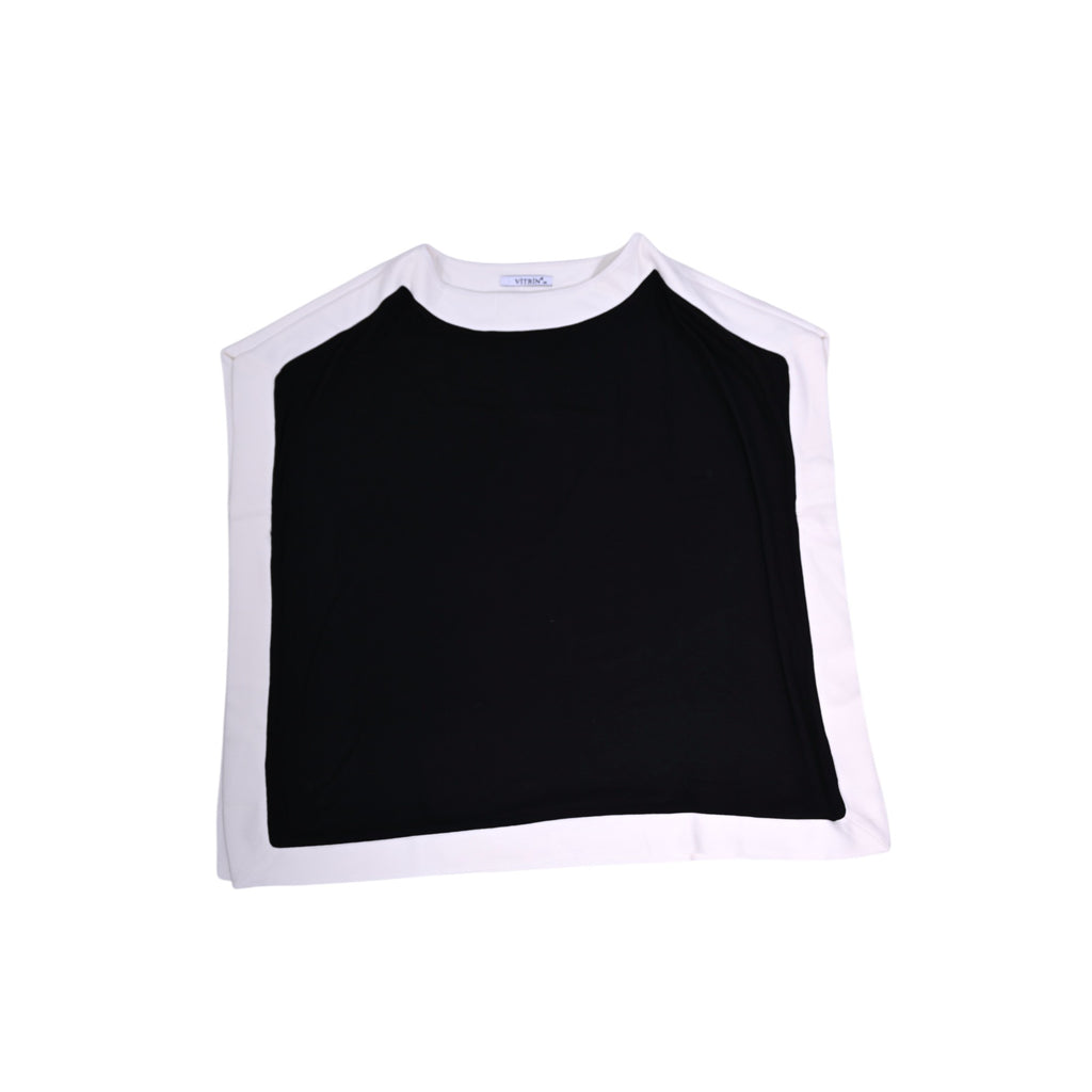 Chic sleeveless black top with contrasting white pane