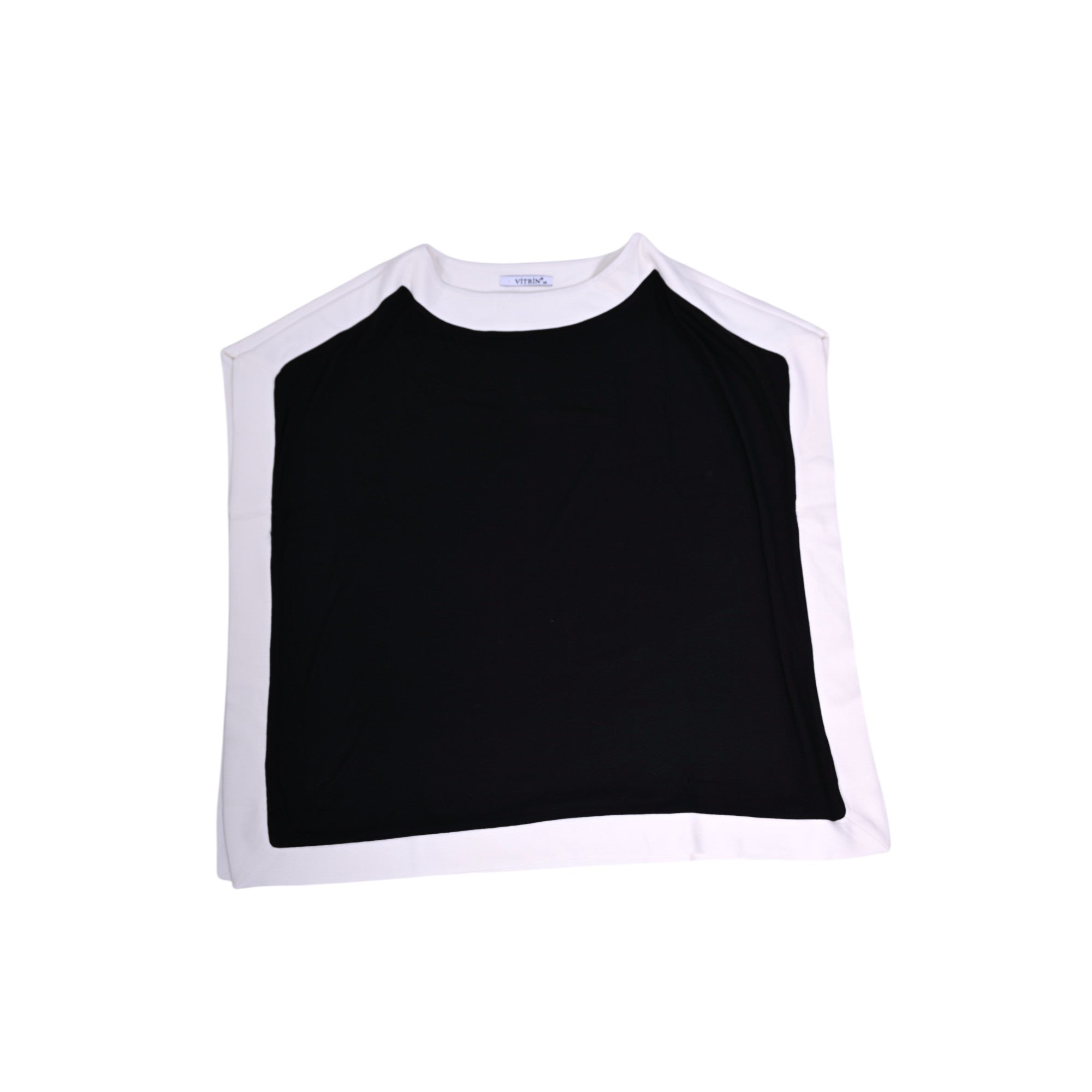 Chic sleeveless black top with contrasting white pane