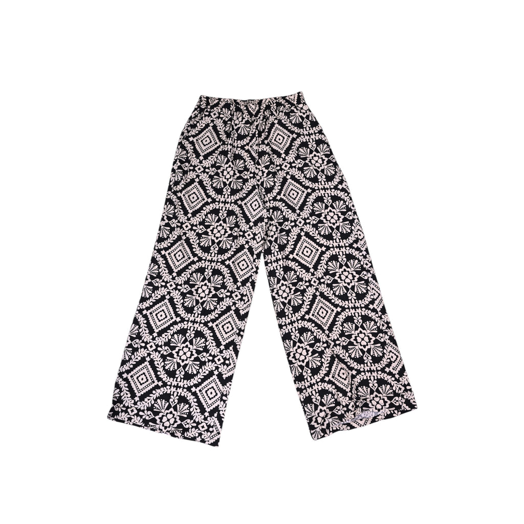 Elegant dark high-waisted wide-leg trousers with an intricate geometric and floral embroidery pattern