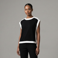 Chic sleeveless black top with contrasting white pane