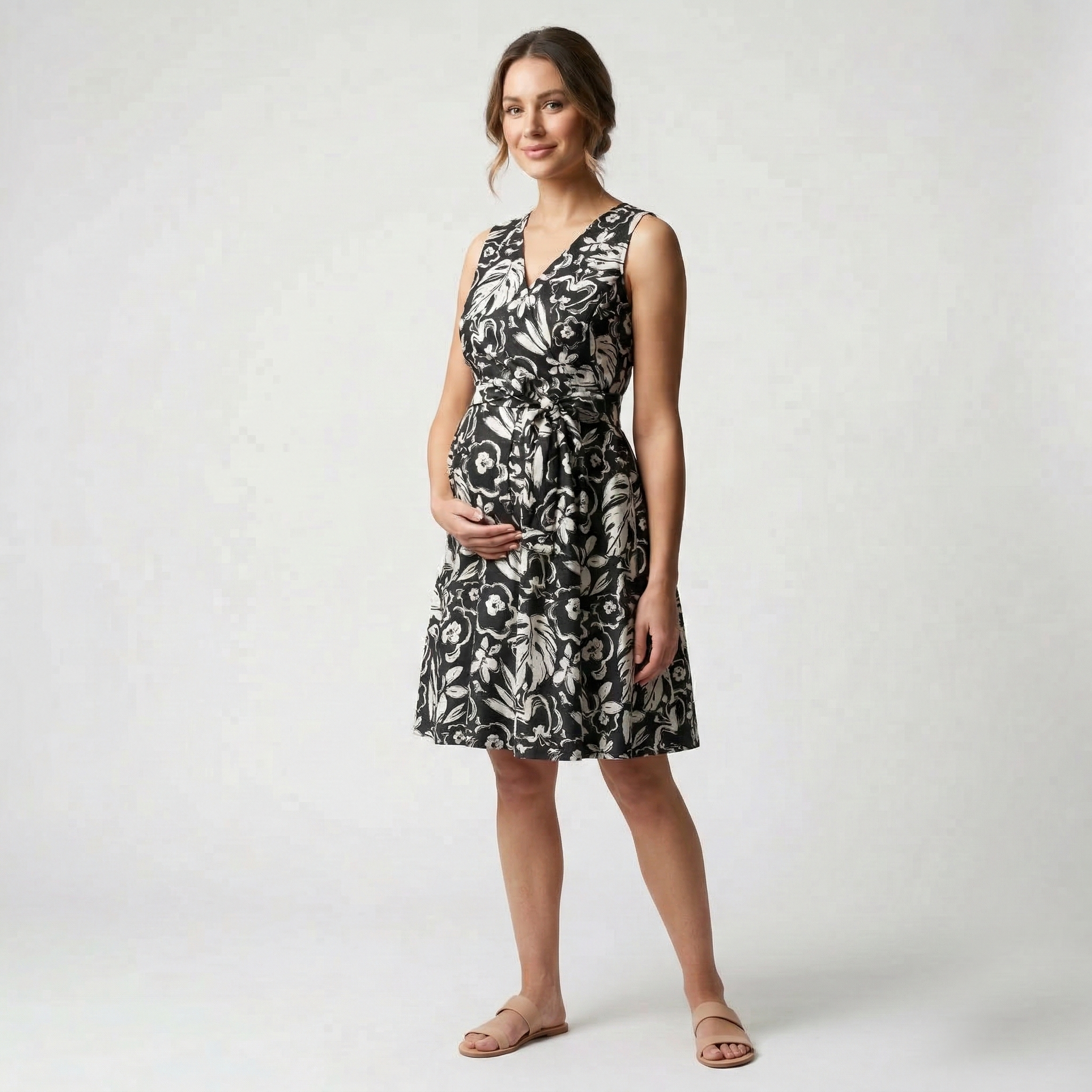 Chic black and white floral maternity wrap dress with a waist tie